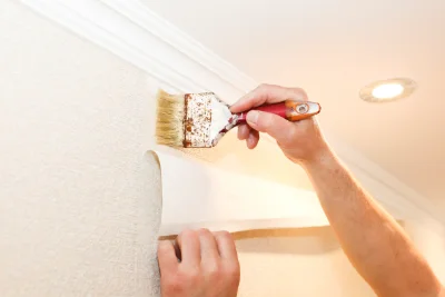Pose de papier peint à Muel — revêtements muraux et toiles de verre